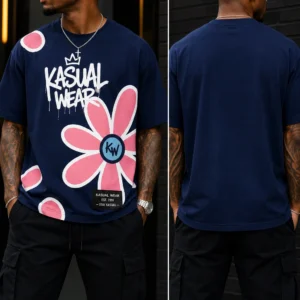 Man wearing floral graphic t-shirt, black pants.